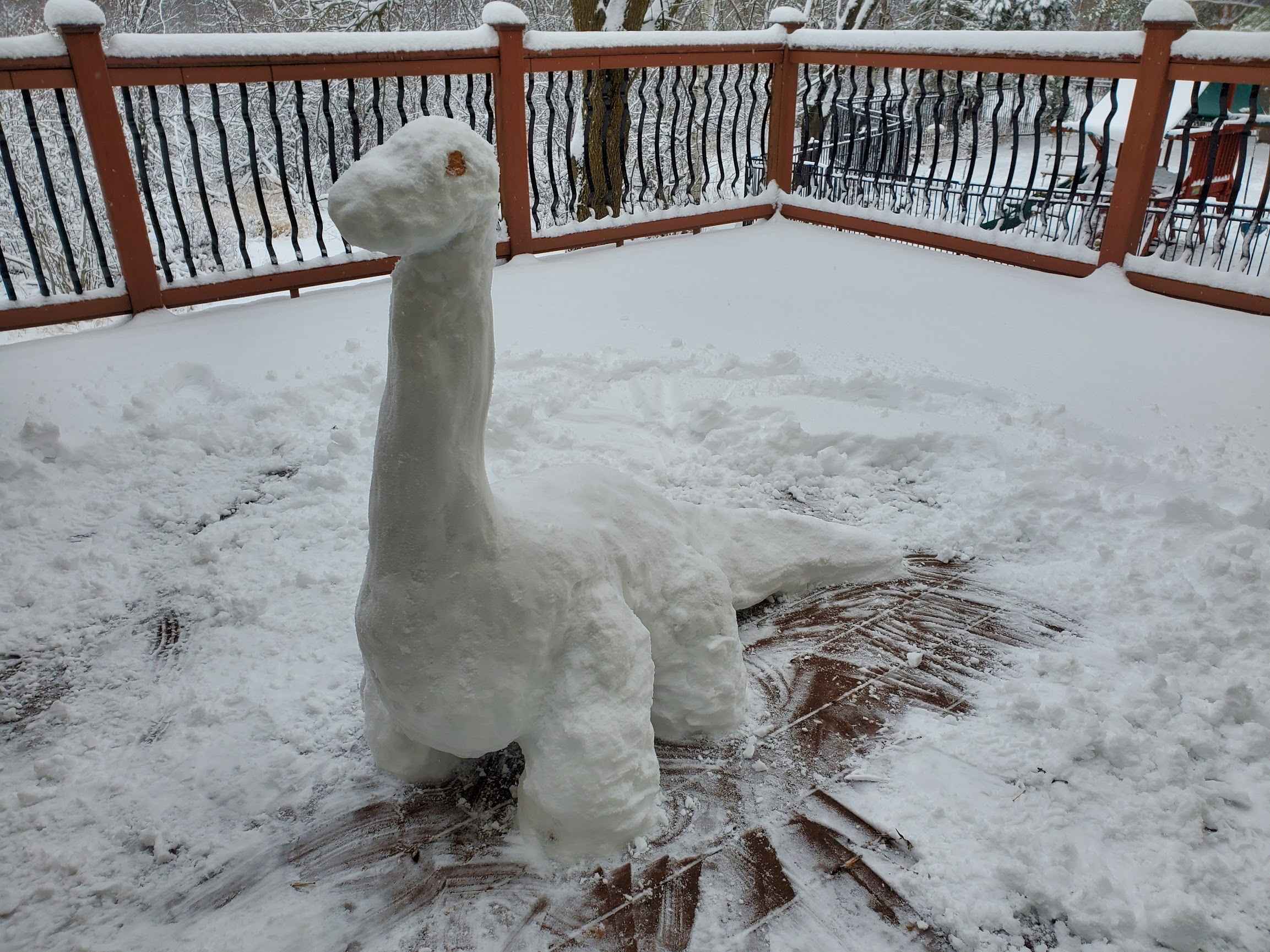 Snow sculpture of dinosaur